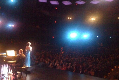 In front of the audience